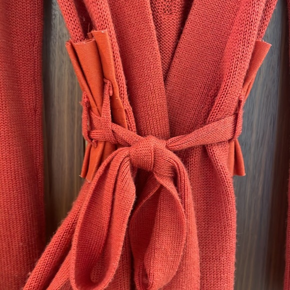 Unique mid-2000’s sweater coat in fun red orange color with waist detailing. - Picture 4 of 8